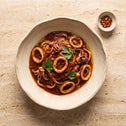 Paste cu calamari în sos de roșii