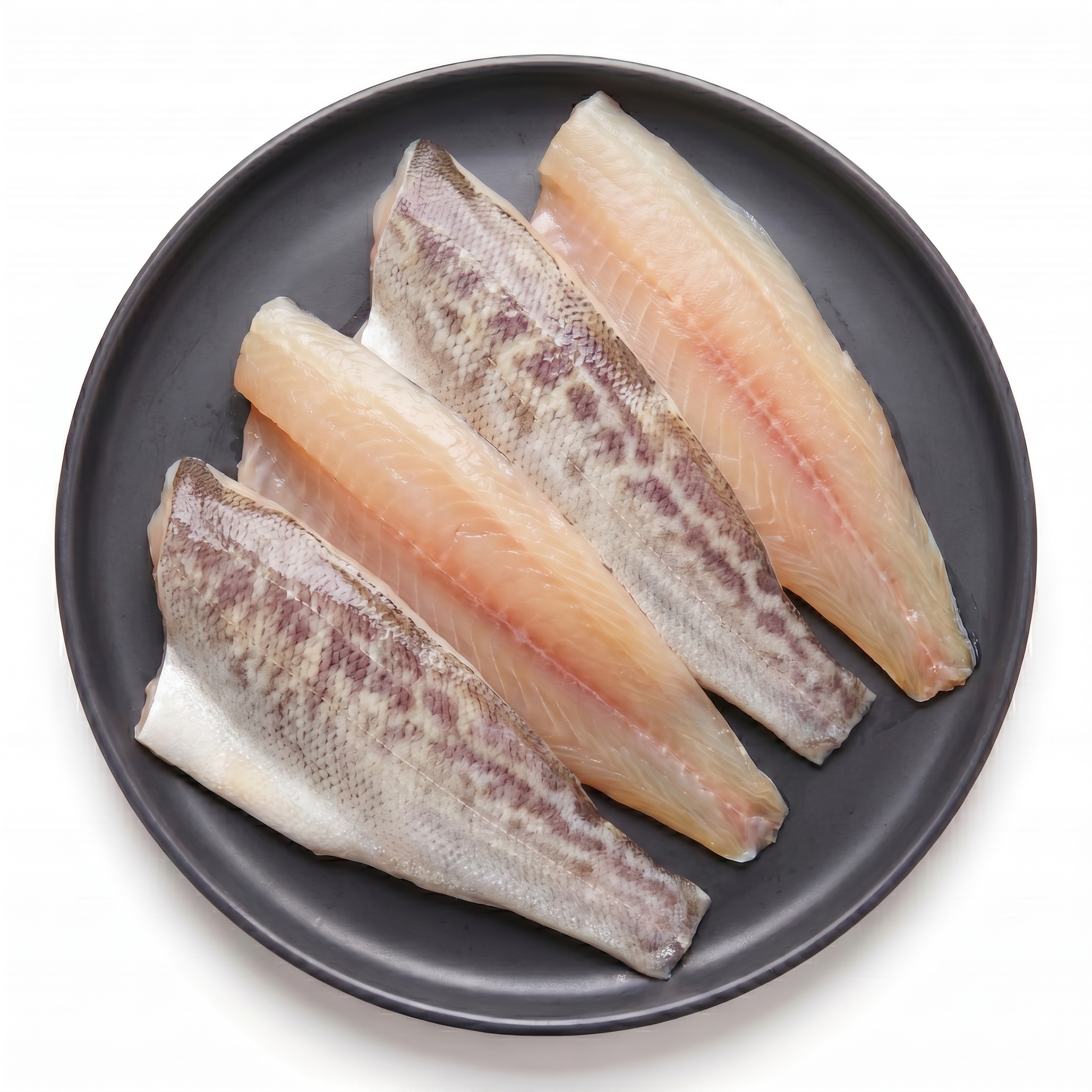 File de grouper crud pe farfurie, vedere de sus