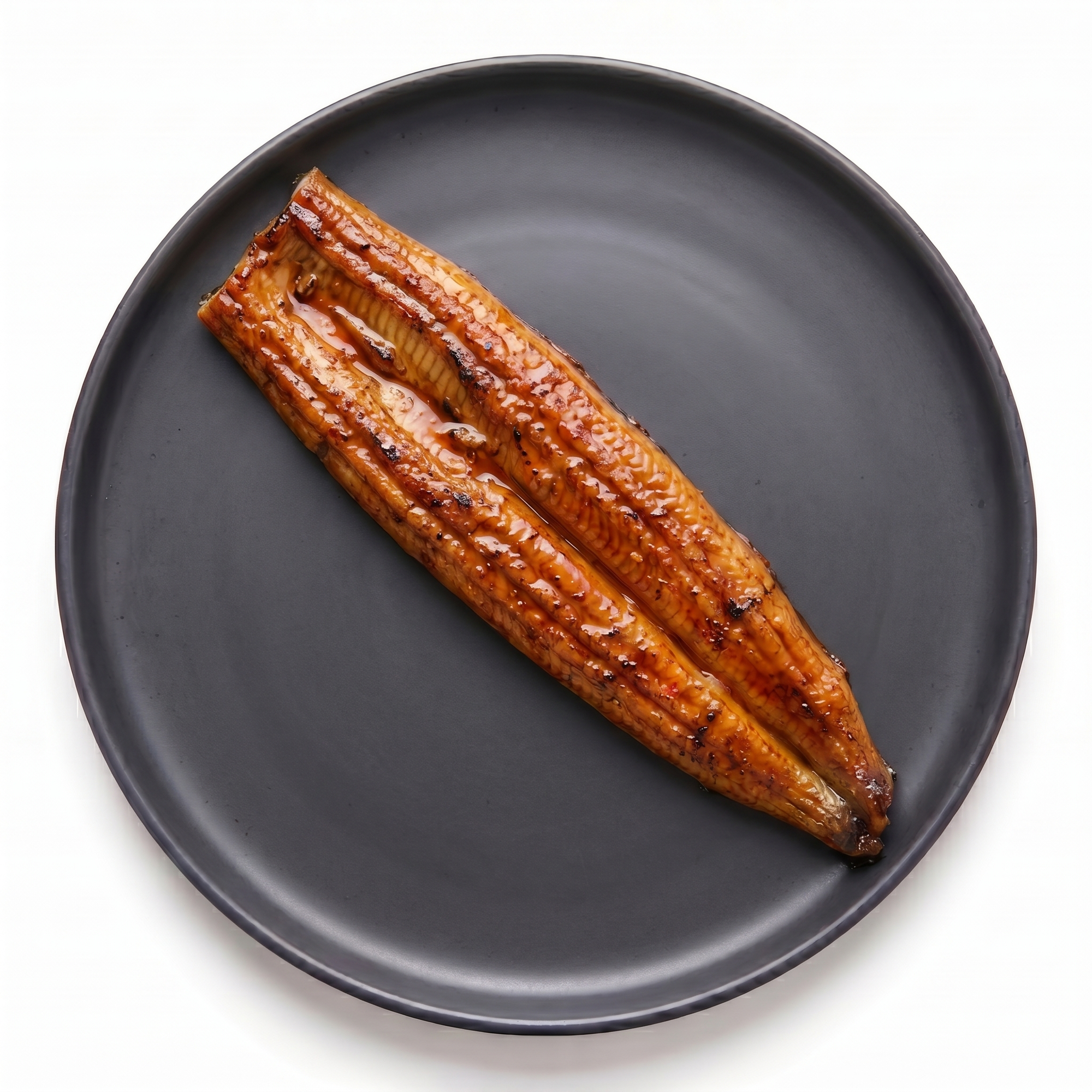 File Unagi Kabayaki glazat pe farfurie
