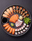 Sushi Night SeriosFood - platou generos sushi si sashimi: nigiri ebi, unagi, somon, caracatita, sashimi somon si caracatita, edamame, gari, wasabi